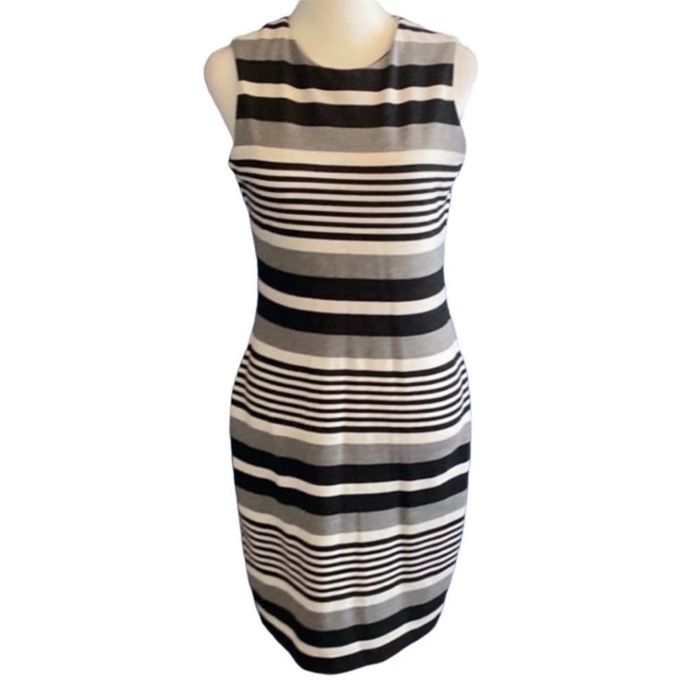 Calvin Klein Black and White Striped Midi Dress. Size 2. Zipper back.